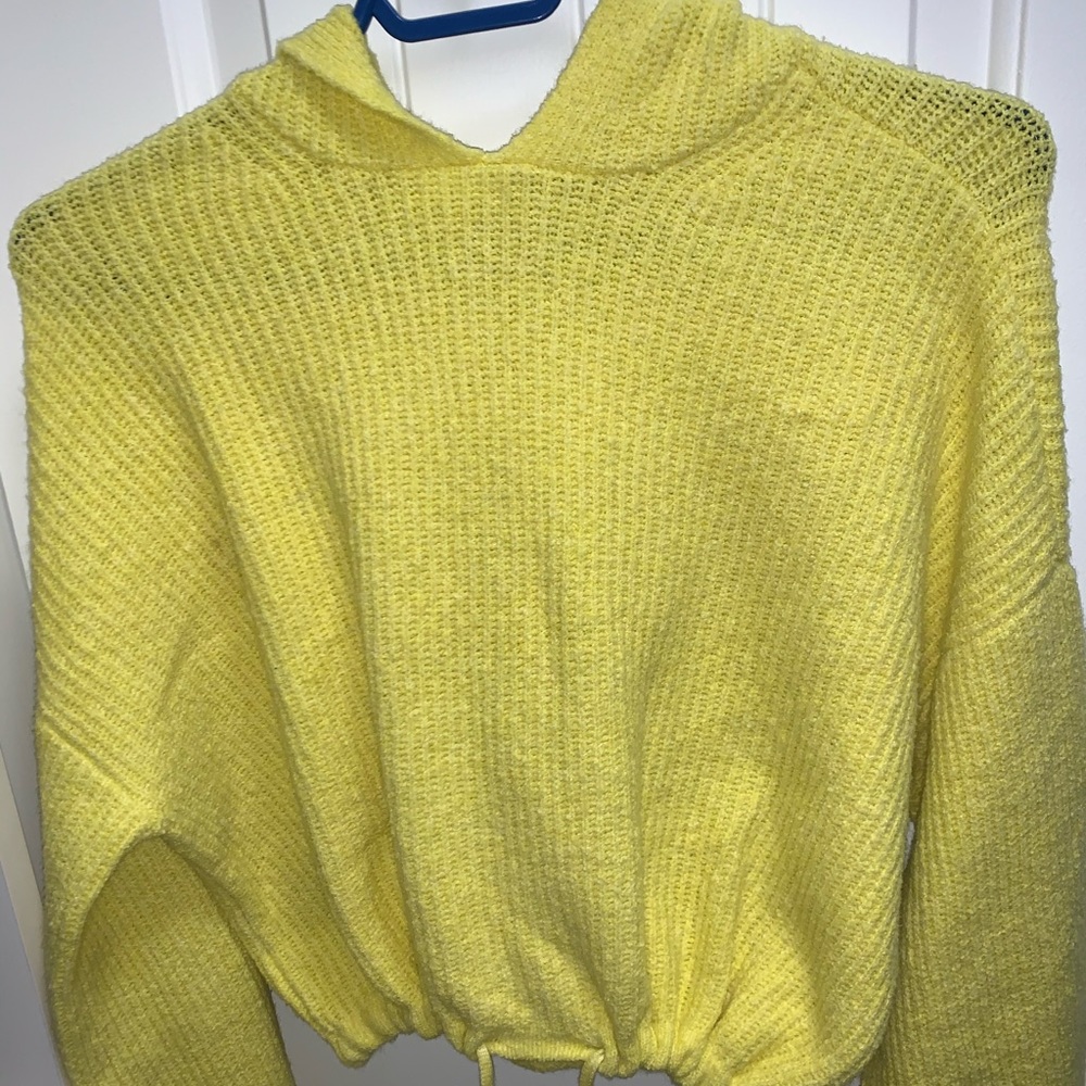 A yellow long sleeve